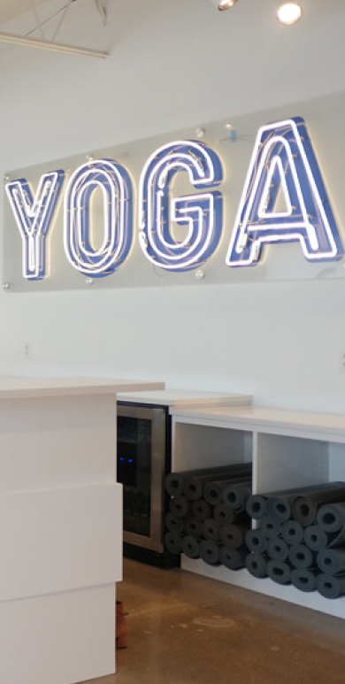 Yoga studio with blue yoga sign